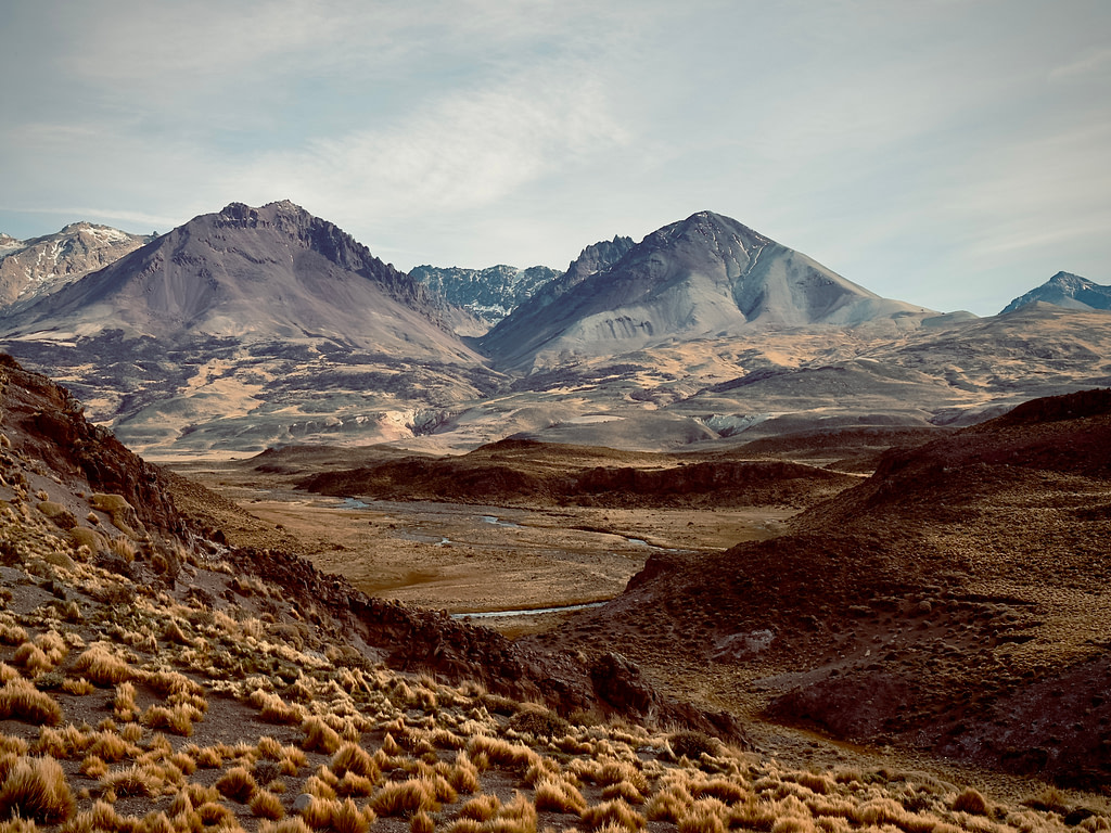 Paso Roballos: a landscape of golden, purple and indigo mountains