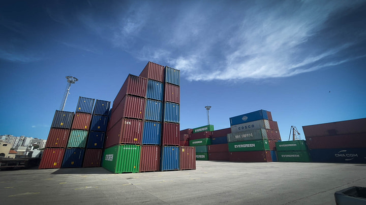 Containers pile up at the port in Montevideo as we wait for our container to be picked and opened for us